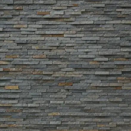 Close-up detail of masterfully crafted stone masonry on a modern home exterior in Corcoran, MN