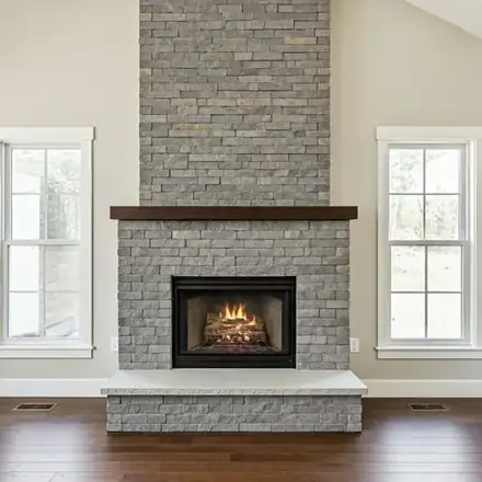 Modern suburban home in Hugo, MN, featuring a newly constructed stone fireplace and hearth
